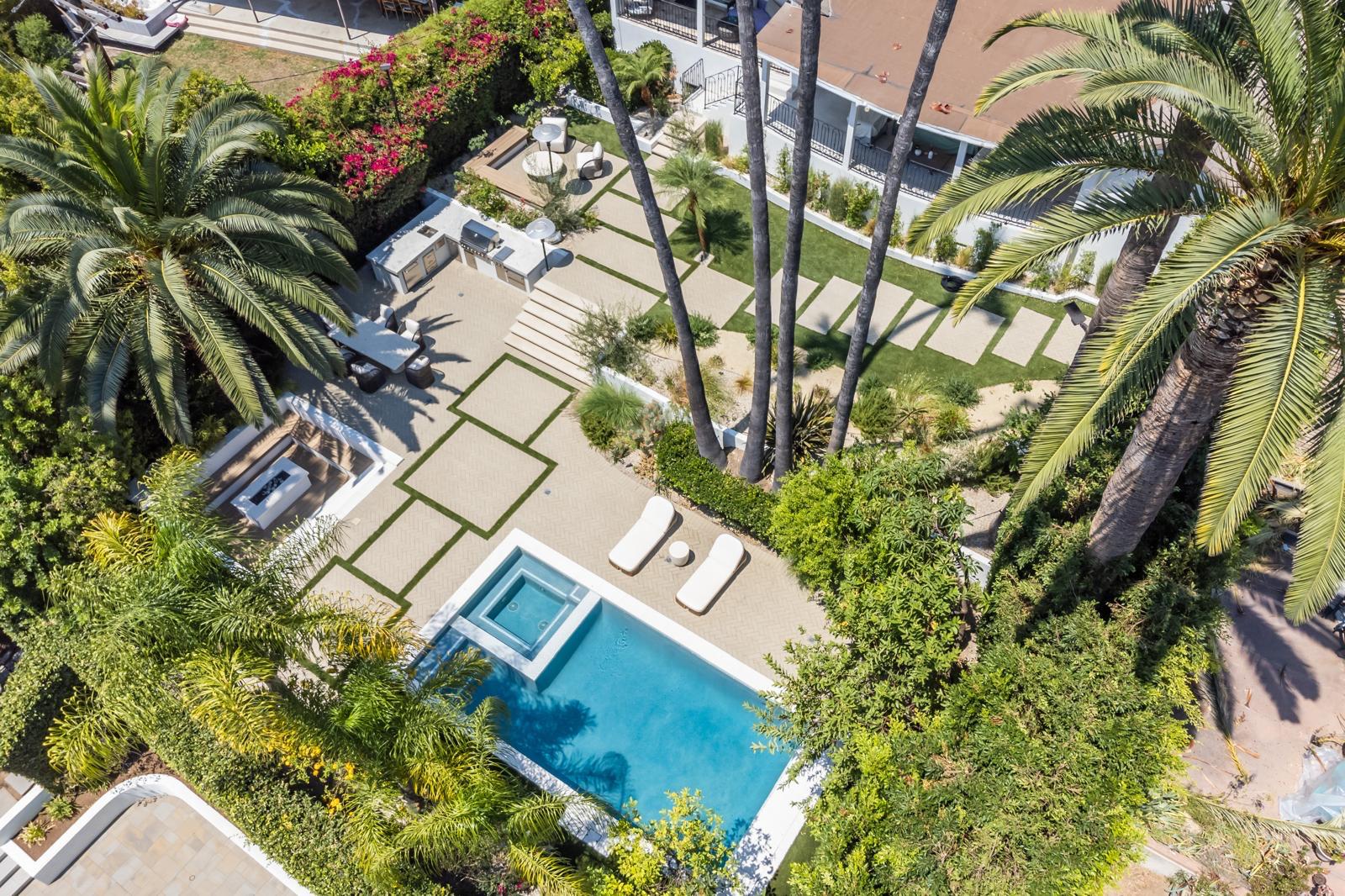 Luxury pool and spa project surrounded by palm trees in Hollywood Hills by Pool Masters LA